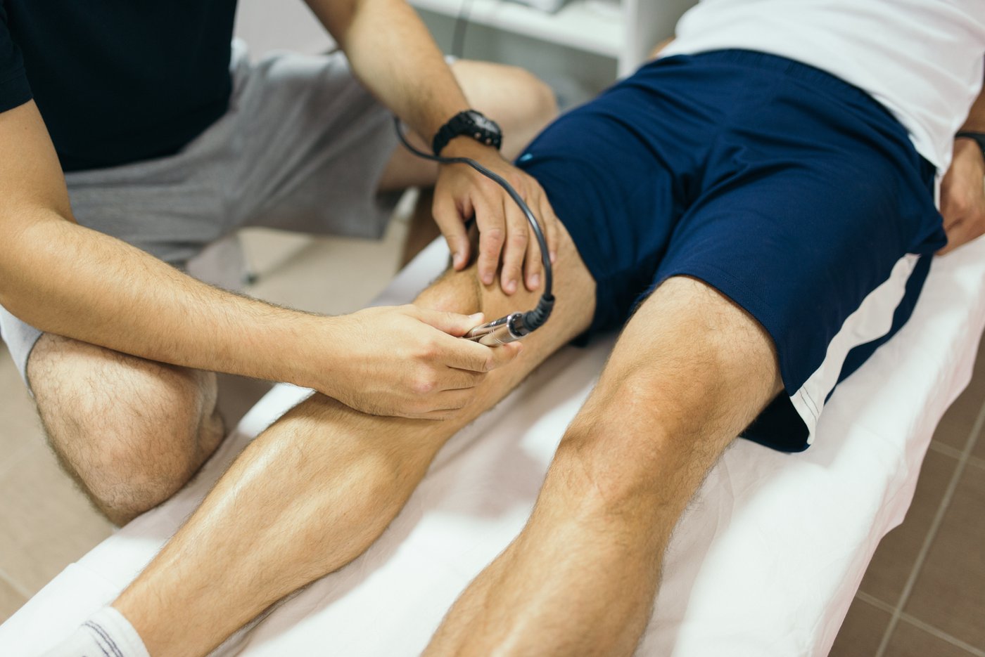 Therapeutic laser probe applied to the knee